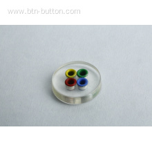 Four-hole color transparent button